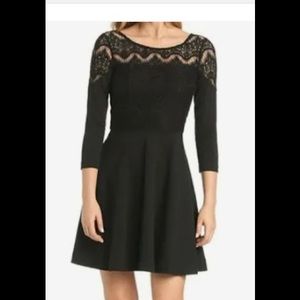 Lily Pulitzer Black Fit & Flare Dress. V- neck back with gold zipper